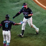 Marlins catcher Laim Hicks hits a two-run homer against the Colorado Rockies