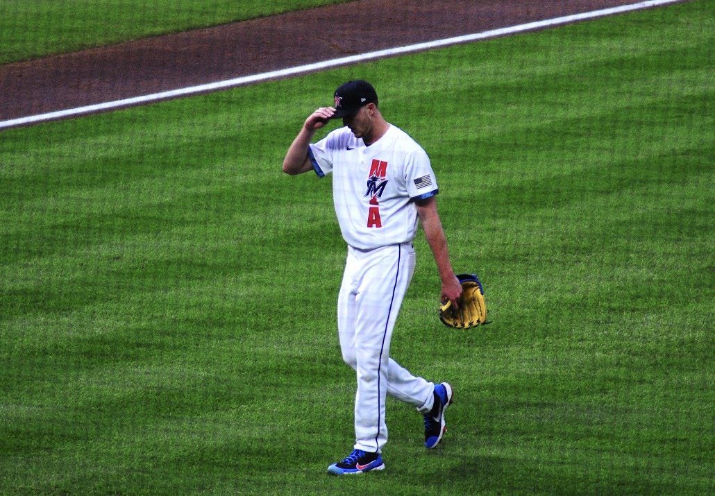 Marlins pitcher Trevor Rogers walks to the dugout after pitching an inning. 