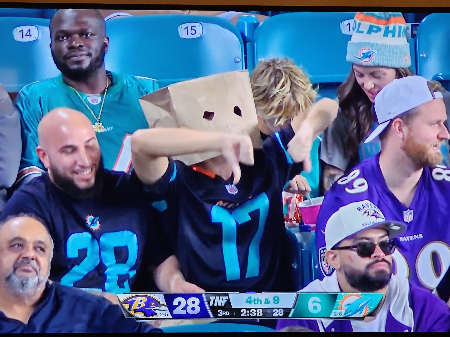 Dolphins fans show their displeasure with their team's latest failure in a 28-6 loss to the Ravens.