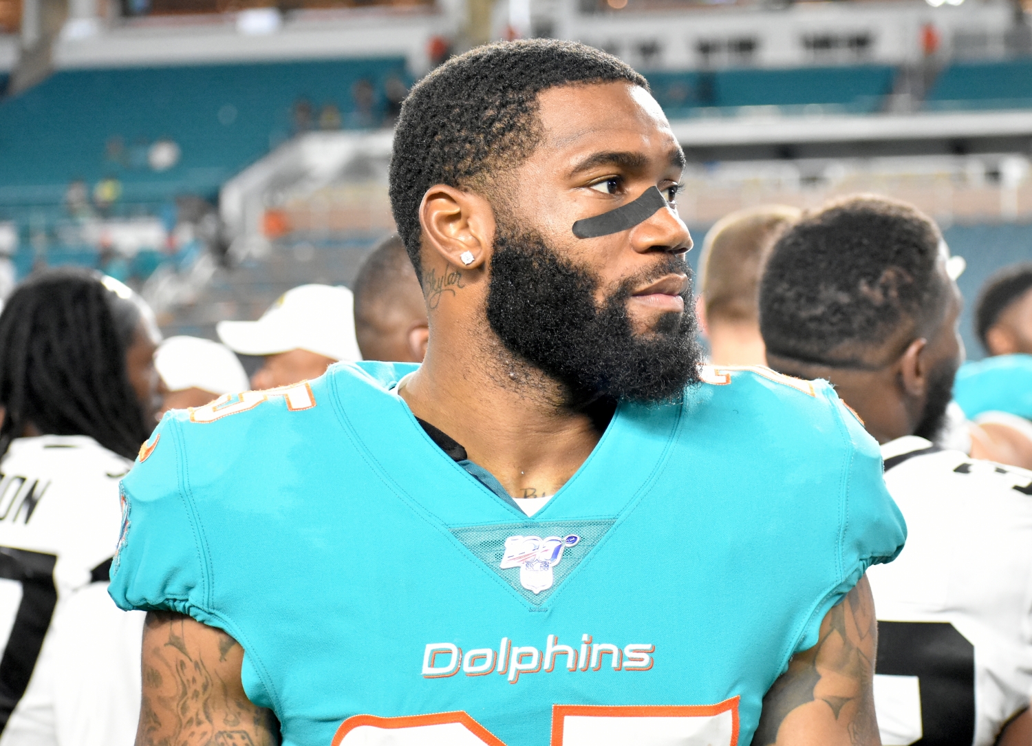 Xavien Howard reported to Miami Dolphins training camp but his contract demands remain unresolved.