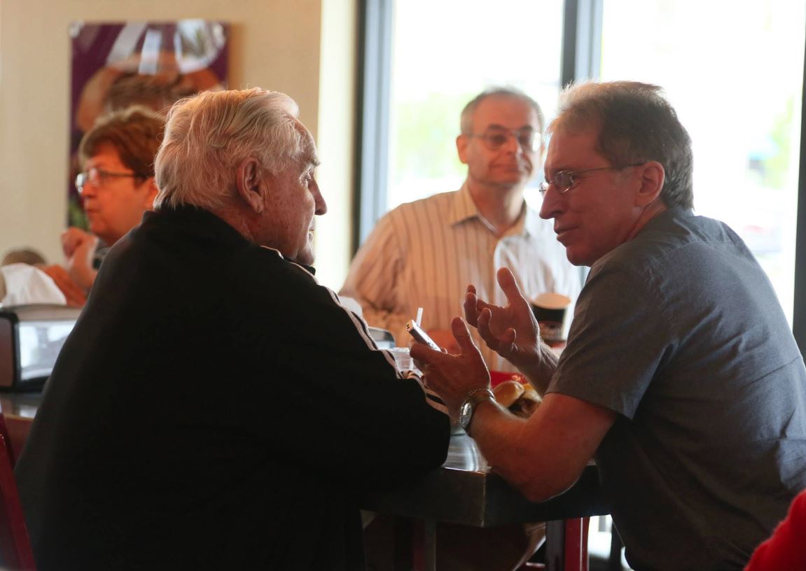 Craig Davis interviews Don Shula during a promotional appearance in 2014.