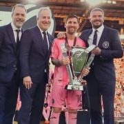 Lionel Messi celebrates Inter Miami's MLS Cup championship with owners David Beckham and Jorge and Jose Mas.