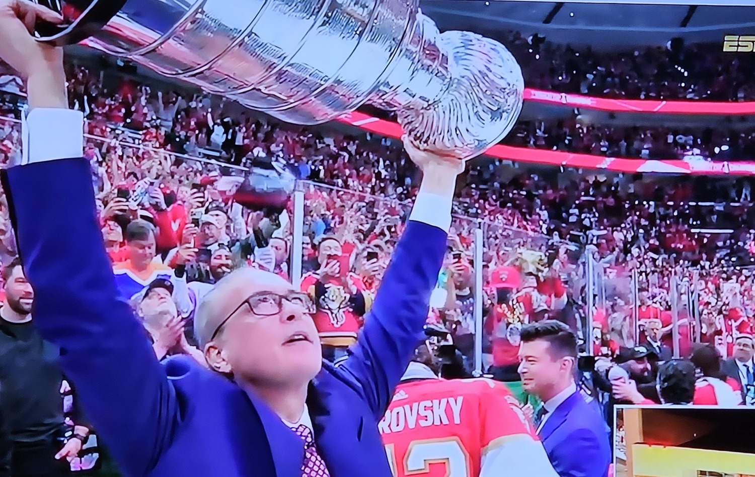 Coach Paul Maurice hoists the Stanley Cup for the first time in his career after the Florida Panthers defeated the Edmonton Oilers in Game 7. (Craig Davis)