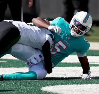 Dolphins quarterback Teddy Bridgewater was knocked out of the game on the first play against the Jets.