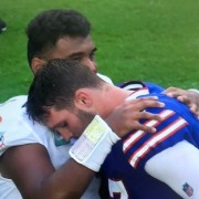 Tua Tagovailoa consoles rival QB Josh Allen after the Dolphins' win against the Bills.