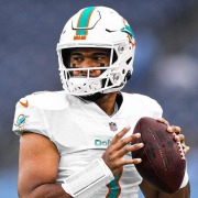 Tua, Dolphins outlast Bears on Fields' record rushing day