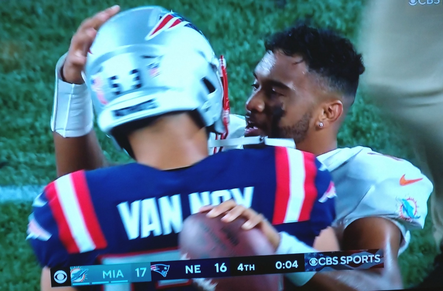 Tua Tagovailoa greets Kyle Van Noy after the Dolphins' win at New England.
