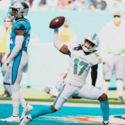 Jaylen Waddle celebrates his touchdown catch in the Miami Dolphins' win over the Carolina Panthers.