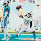 Jaylen Waddle celebrates his touchdown catch in the Miami Dolphins' win over the Carolina Panthers.