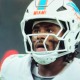Malik Willis ran for a touchdown in his first start for the Dolphins.