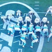 Malik Willis (2) gets ready for the quarterback sneak that sealed the Dolphins' win against the Jets.